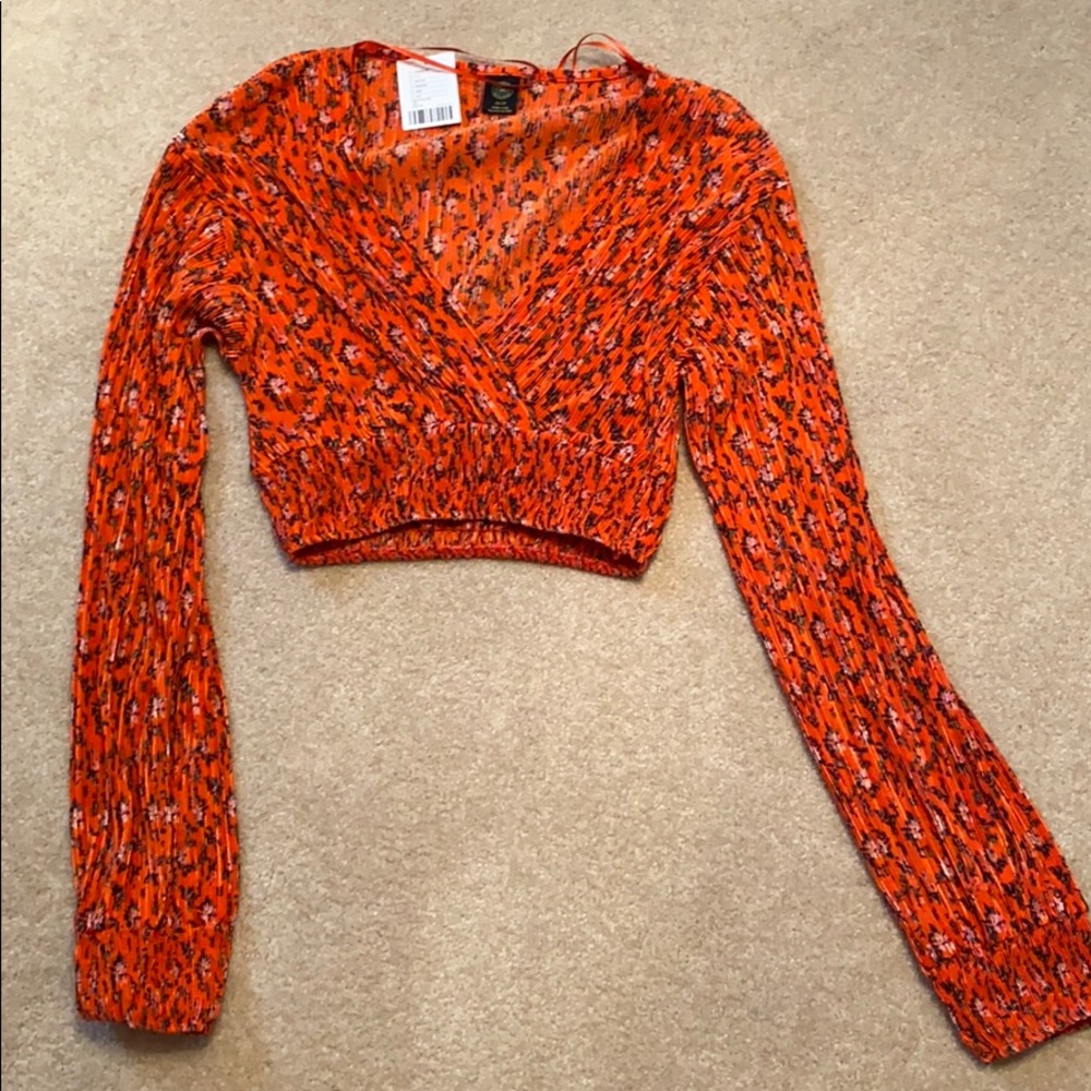 Redish/orangish floral going out top